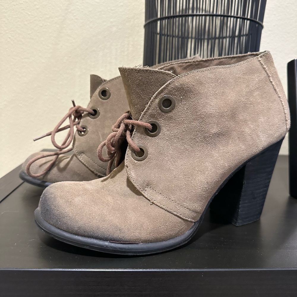 Tan laced booties with heels, unique look. MIA women’s size 8.5